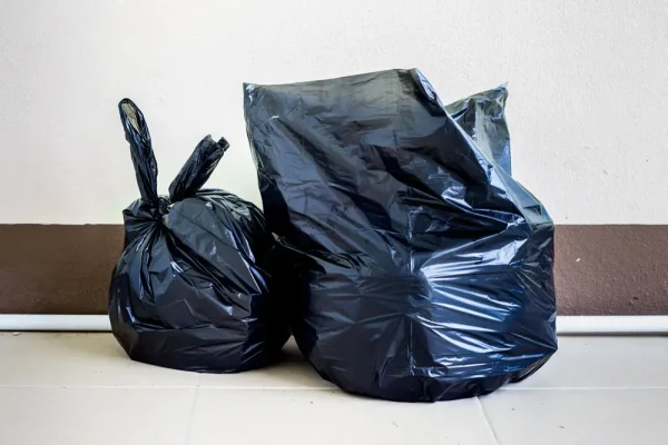 garbage-bags-floor-against-wall